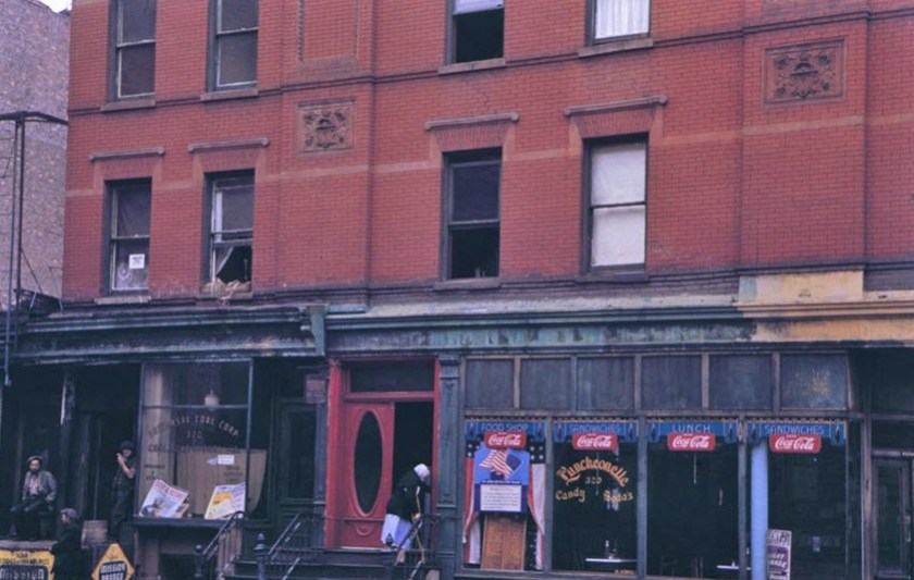 Store fronts below brick tenement (1942): Charles W. Cushman Photography Collection / Indiana University Archives